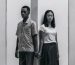 portrait-interracial-young-couple-ignoring-each-other-against-white-backdrop_926199-2687722